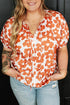 Plus Size Printed Tie Neck Short Sleeve Blouse - Nikki’s Place