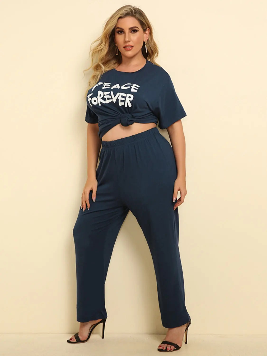 Plus Size PEACE FOREVER Short Sleeve Top and Pants Set - Nikki’s Place