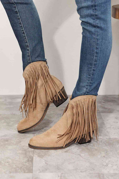 CowboyBoots, WesternFashion, FringeAnkleBoots, CowgirlStyle, RodeoChic, StylishFootwear, FestivalBoots, FashionStatement, ChicCowboy, TrendyAnkleBoots, VintageVibes, StatementFootwear, WildWestFashion, CountryStyle, AuthenticWestern