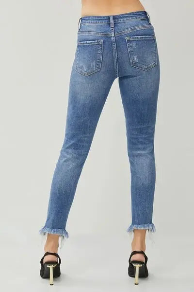 RISEN Distressed Frayed Hem Slim Jeans - Nikki’s Place