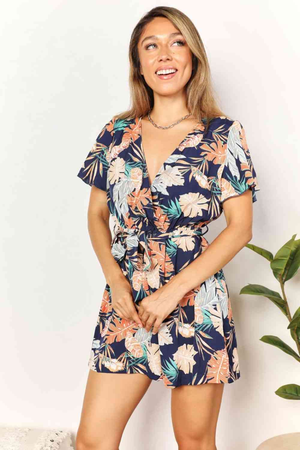 Double Take Botanical Print Surplice Neck Tie Waist Romper - Nikki’s Place