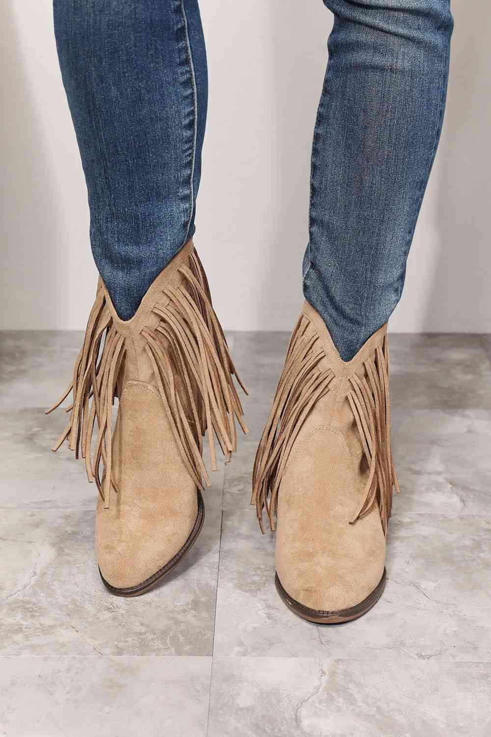 CowboyBoots, WesternFashion, FringeAnkleBoots, CowgirlStyle, RodeoChic, StylishFootwear, FestivalBoots, FashionStatement, ChicCowboy, TrendyAnkleBoots, VintageVibes, StatementFootwear, WildWestFashion, CountryStyle, AuthenticWestern