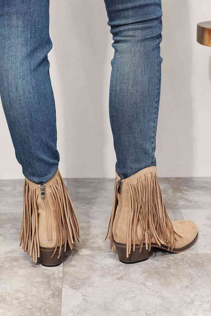 CowboyBoots, WesternFashion, FringeAnkleBoots, CowgirlStyle, RodeoChic, StylishFootwear, FestivalBoots, FashionStatement, ChicCowboy, TrendyAnkleBoots, VintageVibes, StatementFootwear, WildWestFashion, CountryStyle, AuthenticWestern