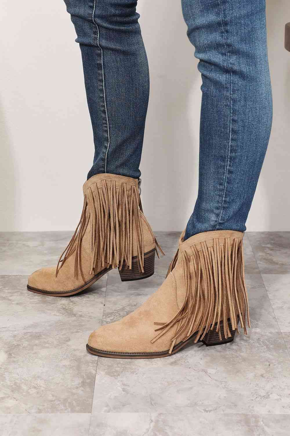 CowboyBoots, WesternFashion, FringeAnkleBoots, CowgirlStyle, RodeoChic, StylishFootwear, FestivalBoots, FashionStatement, ChicCowboy, TrendyAnkleBoots, VintageVibes, StatementFootwear, WildWestFashion, CountryStyle, AuthenticWestern